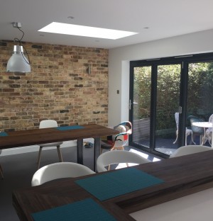 Large dining room leading to the garden